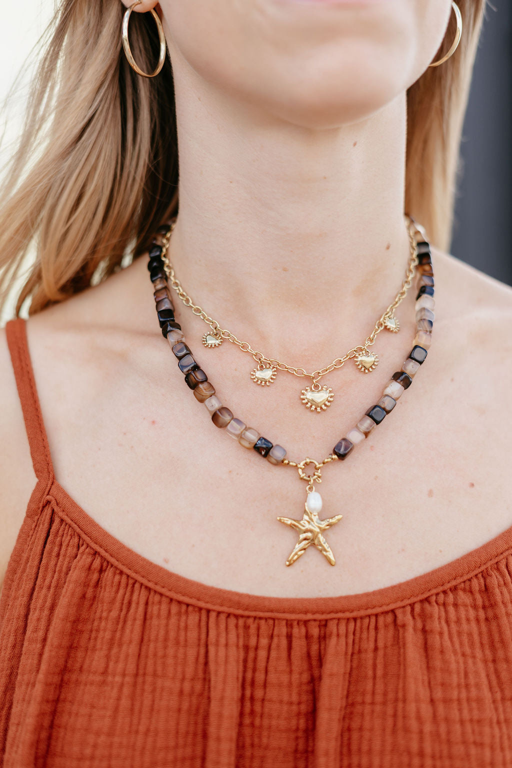 Schakelketting goud zon hart bedels
