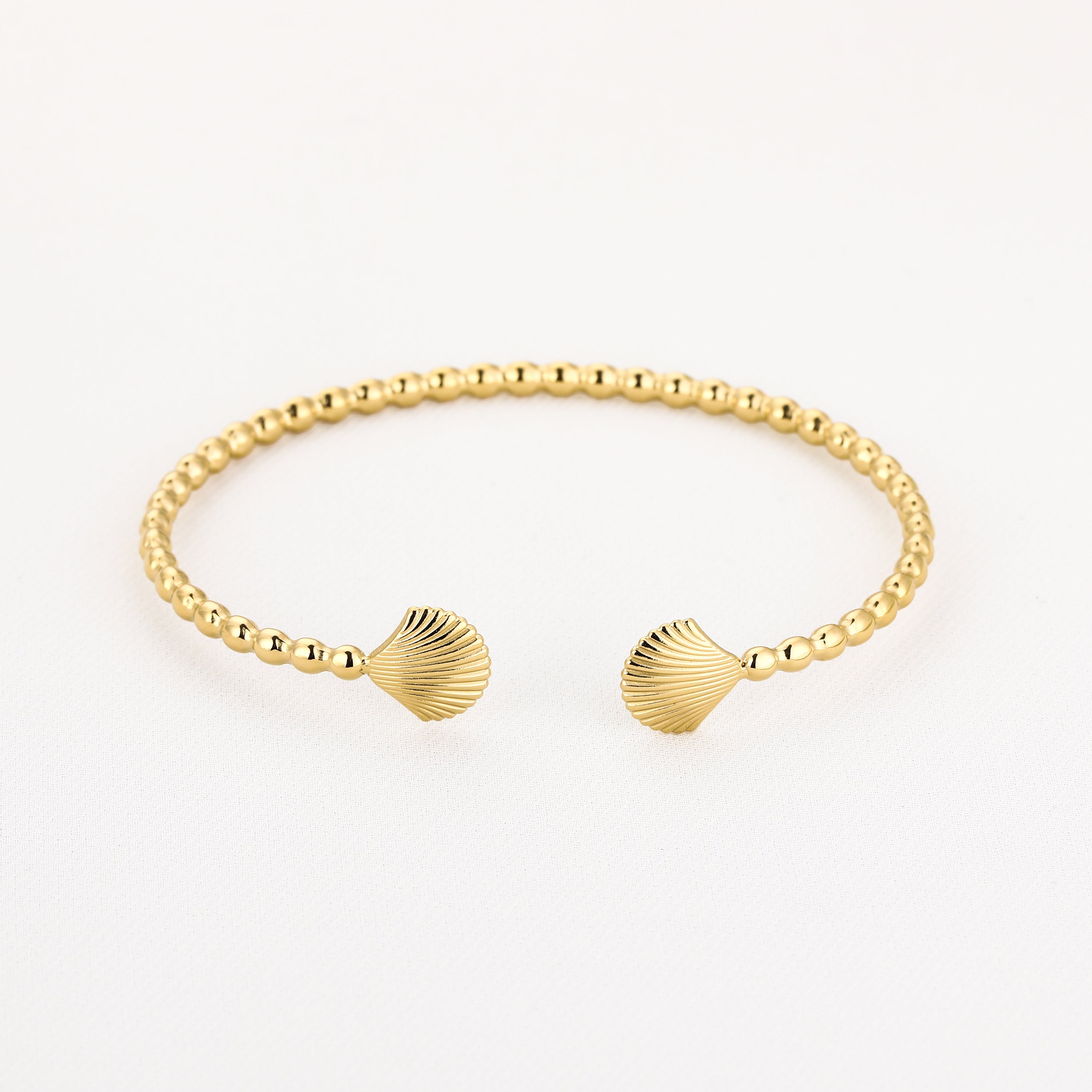Bangle armband goud schelpjes