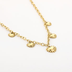 Schakelketting goud zon hart bedels