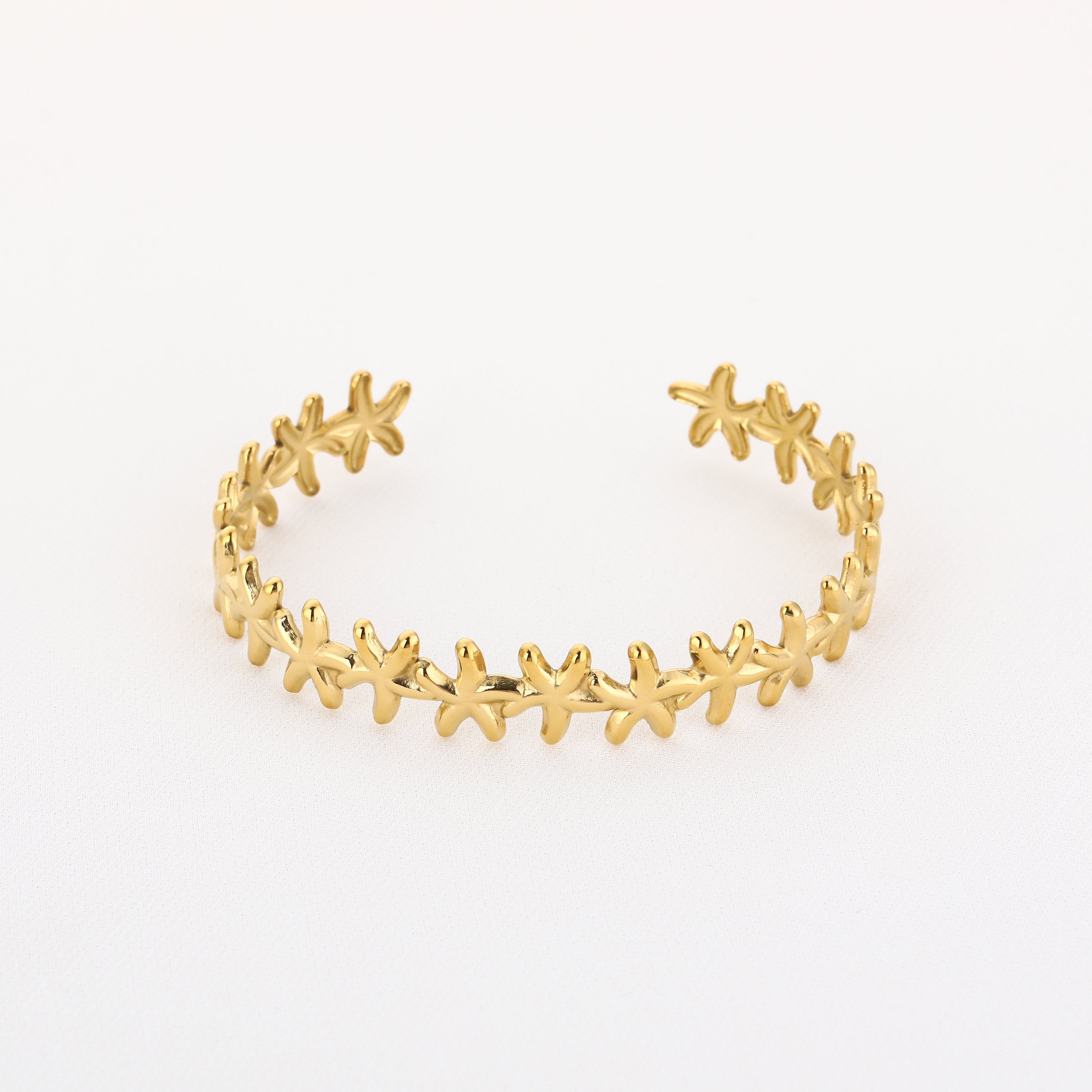 Bangle armband goud zeesterren