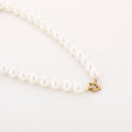 Parelketting stainless steel wit goud
